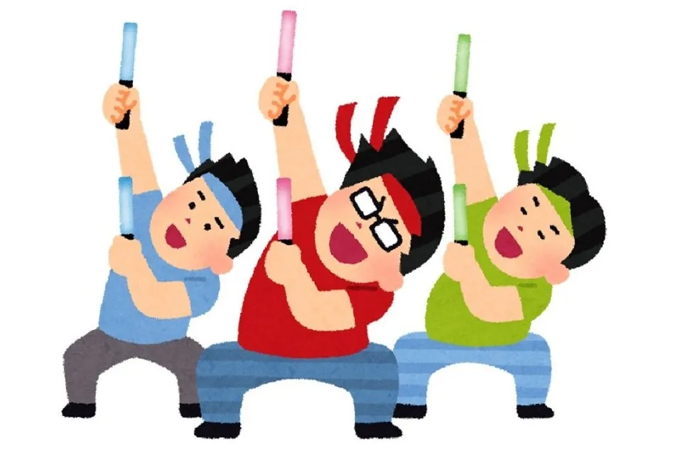 ペンライトを握って踊るオタクたち