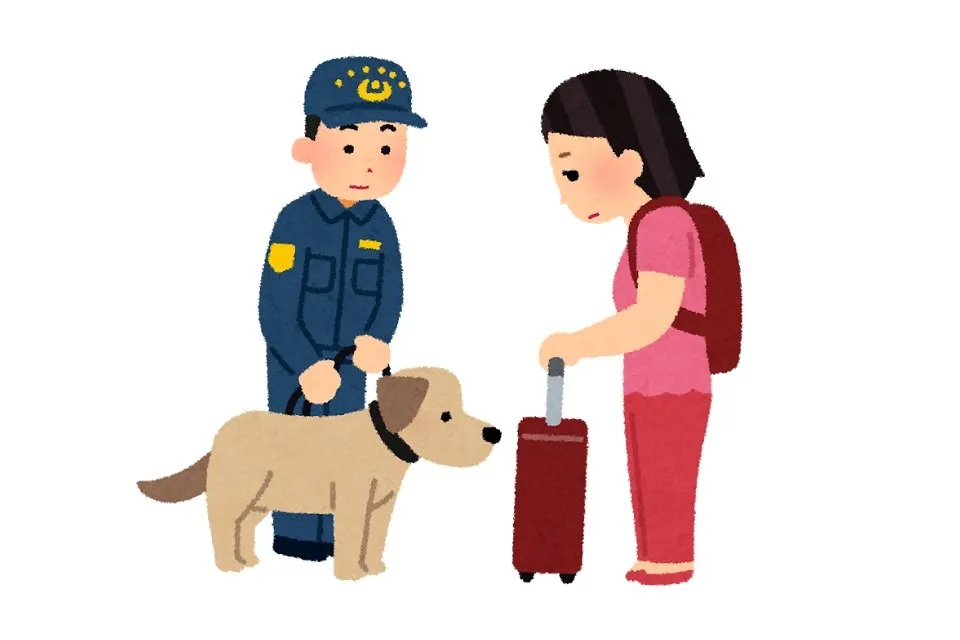 麻薬探知犬による荷物チェック