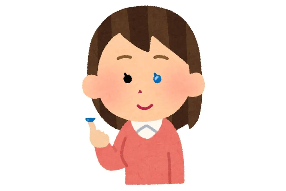 コンタクトを付ける女性